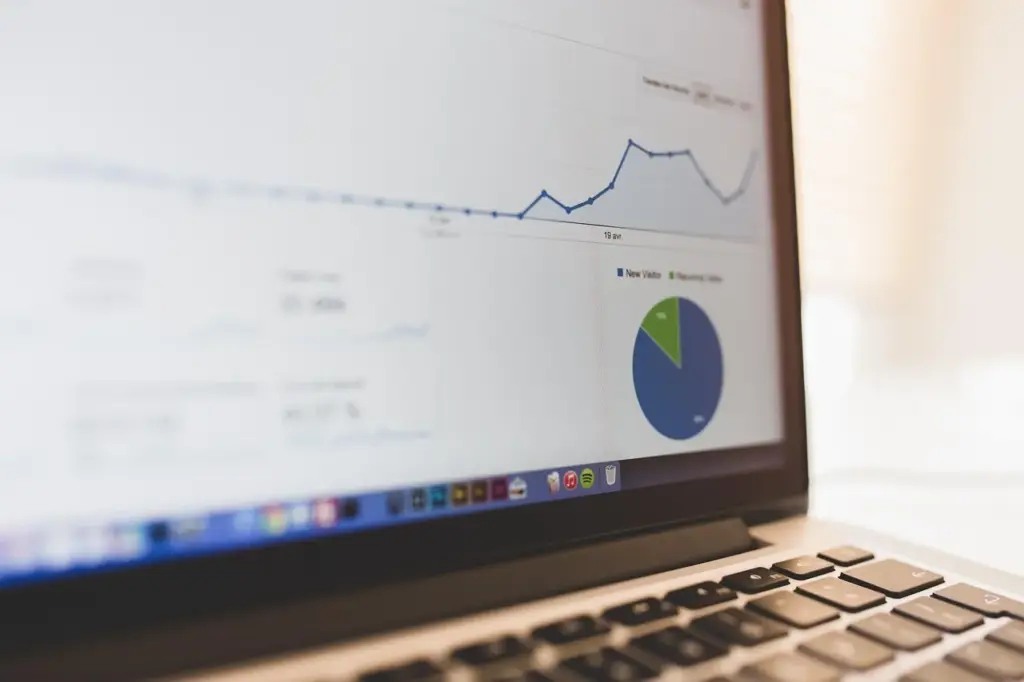 Laptop displaying a CDN configuration dashboard for WordPress