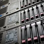 Server rack with glowing lights in a data center representing Redis cache setup for WordPress